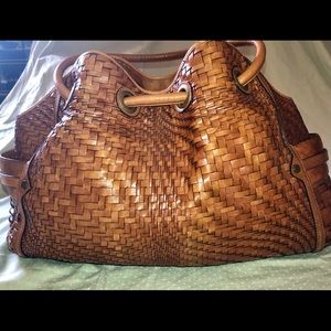 Camel colored Coke Haan weaved leather tote bag